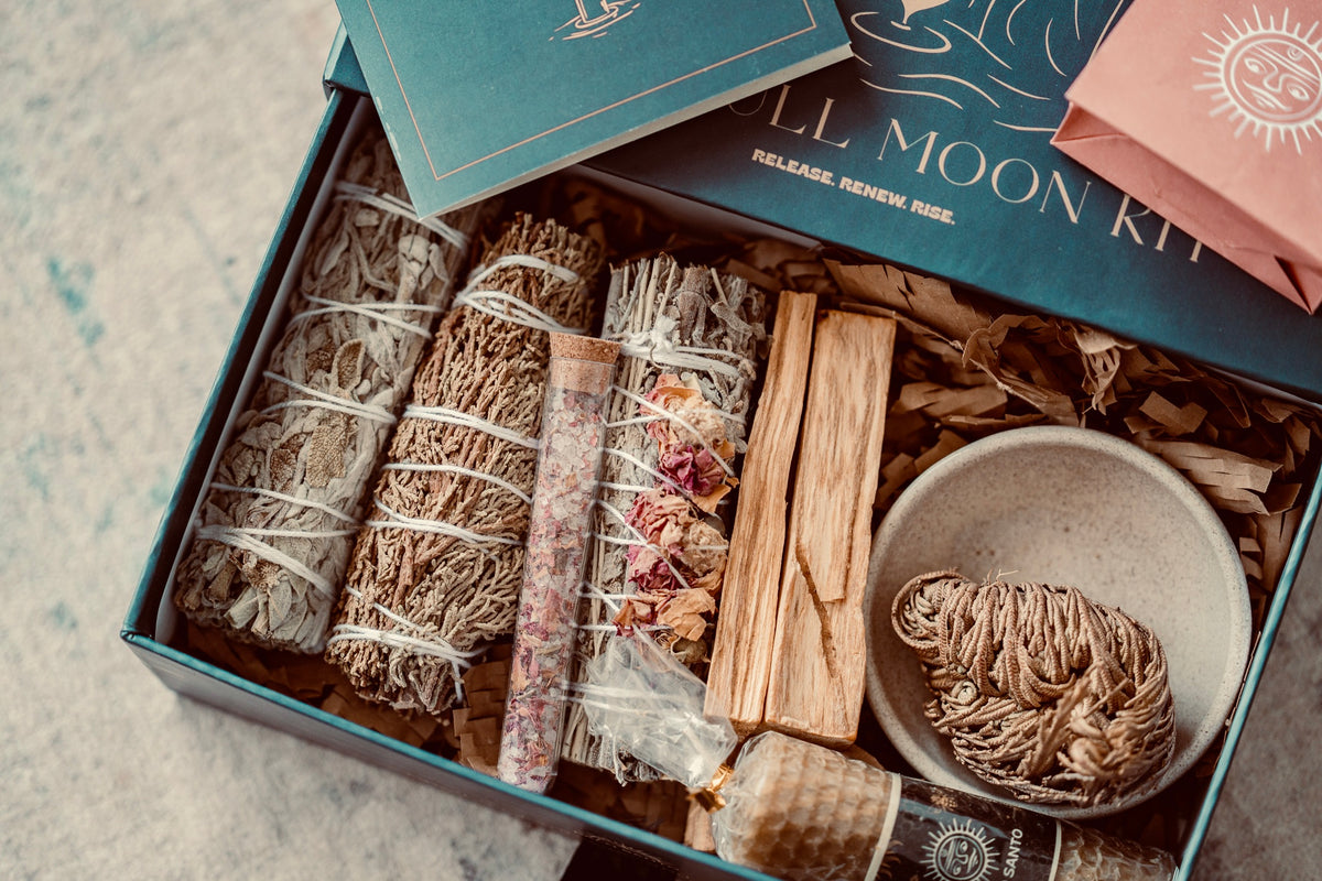 Full moon ritual kit contents including sage smudge, dreamwalker smudge, palo santo, cedar and beeswax candle